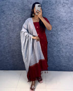 Premium Silk cotton Kurti adorned with Elegant Zari butta work.