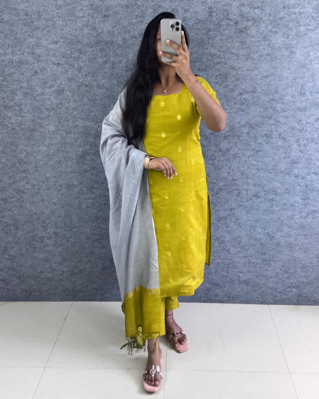 Premium Silk cotton Kurti adorned with Elegant Zari butta work.