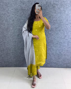 Premium Silk cotton Kurti adorned with Elegant Zari butta work.